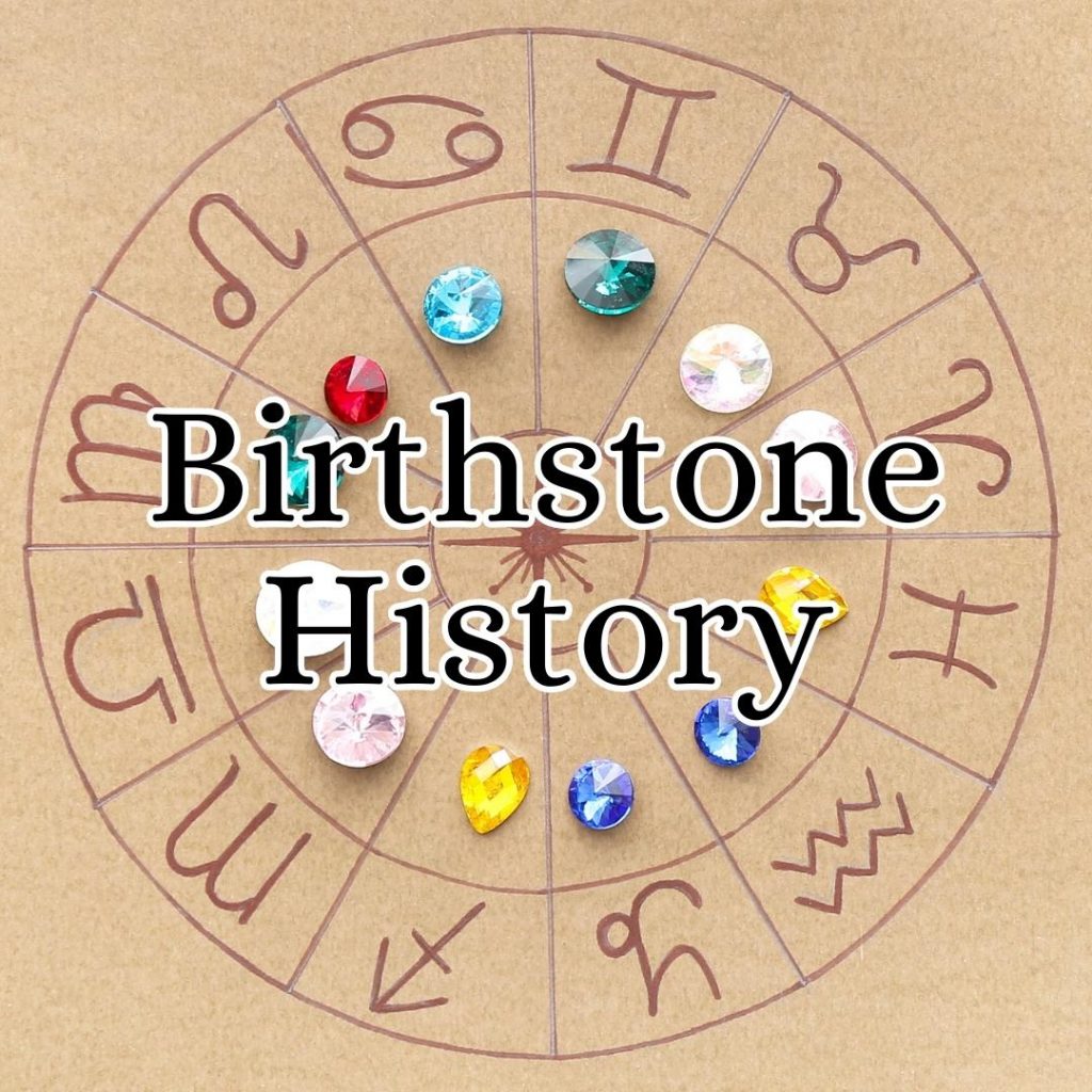 Zodiac wheel with colorful birthstones on a brown background. The text "Birthstone History" overlays the image, suggesting a blend of astrology and gemology.