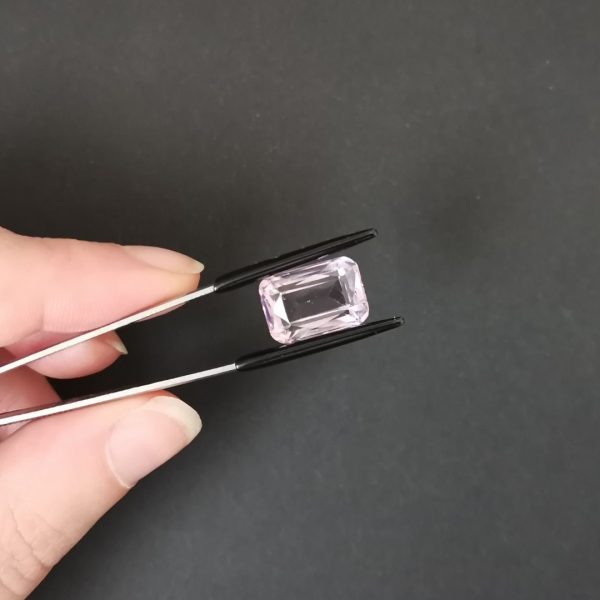 A photo of the crown area of the purple amethyst against a black background