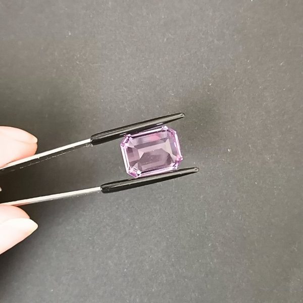 a photo of the pavilion of the purple amethyst rectangle against a black background