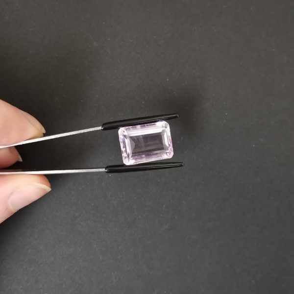 A photo of the crown area of the purple amethyst against a black background
