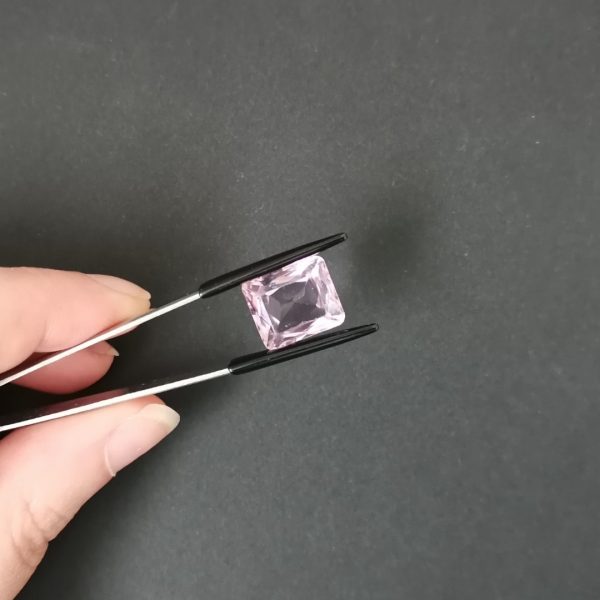 A photo of the crown area of the purple amethyst against a black background