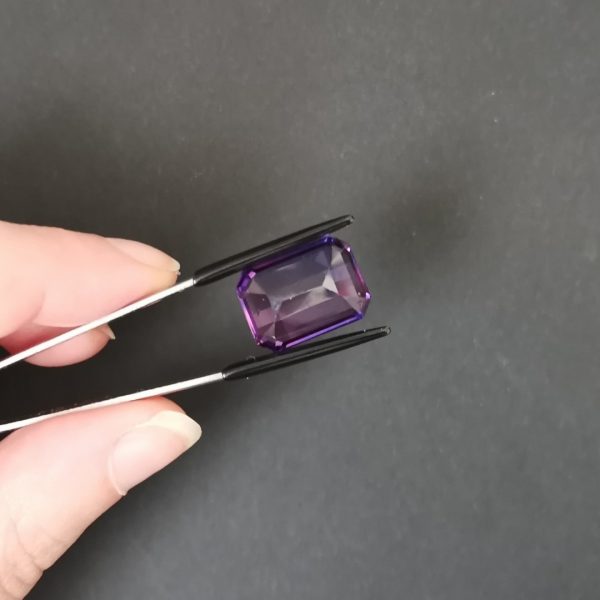 a photo of the pavilion of the purple lab grown rectangle against a black background