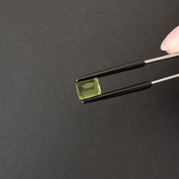 a photo of the pavilion of the green peridot rectangle against a black background