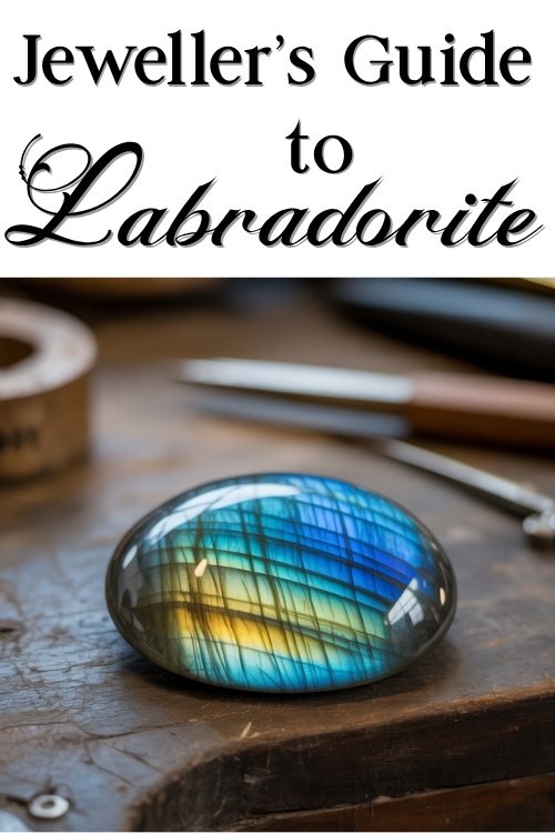 A polished labradorite gemstone with vibrant blue and gold hues on a wooden table. 'Jeweller’s Guide to Labradorite' text above. Tools in soft focus.