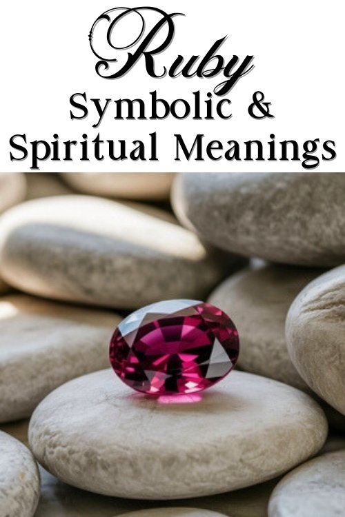 A radiant ruby rests on smooth gray stones, conveying elegance and serenity. Text above reads "Ruby Symbolic & Spiritual Meanings" in elegant script.