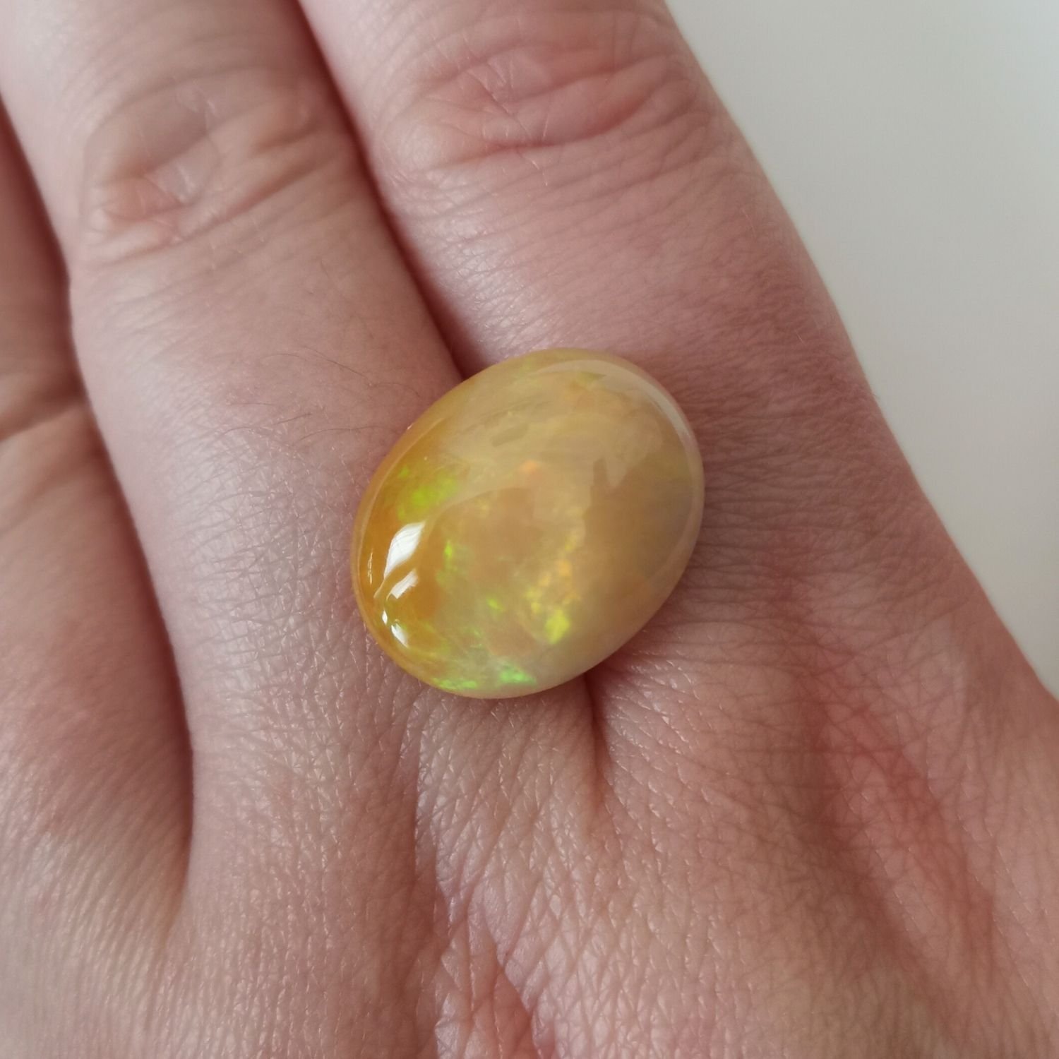 Orange oval opal cabochon - 18.4mm by 14.4mm - Image 3