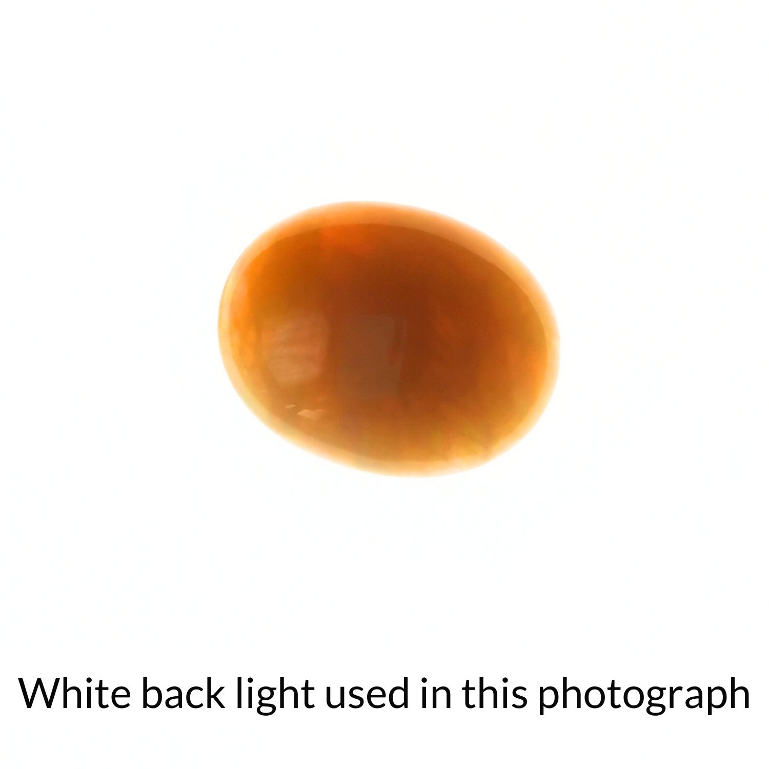 Orange oval opal cabochon - 18.4mm by 14.4mm - Image 4