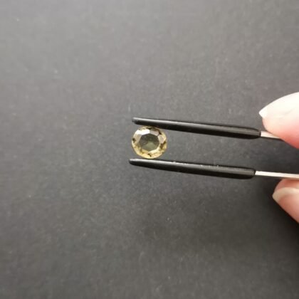 Green Zircon Oval - 6.8mm by 6.1mm