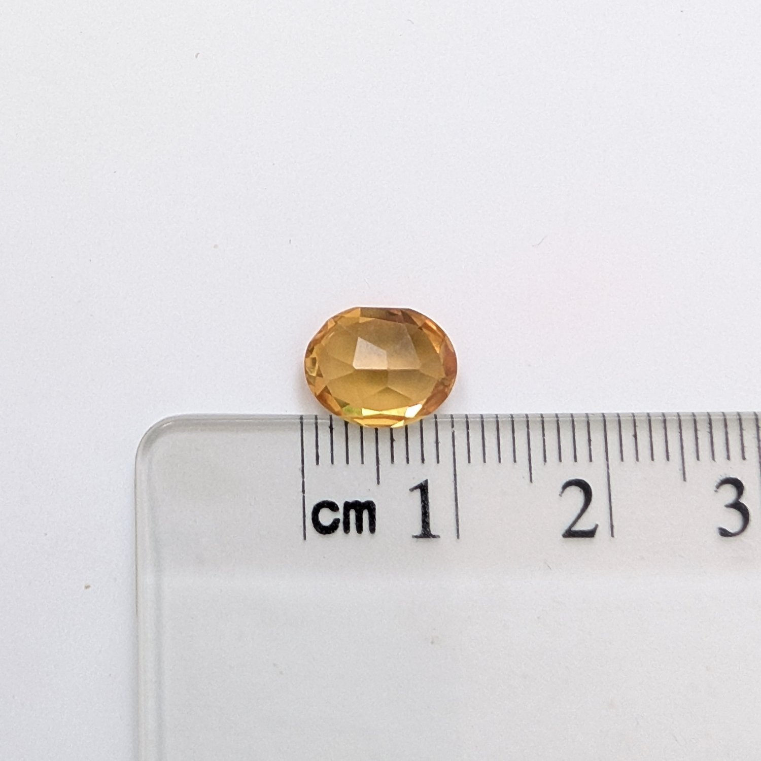 Lab Grown Orange Sapphire Oval - 10mm by 7.8mm - Image 3