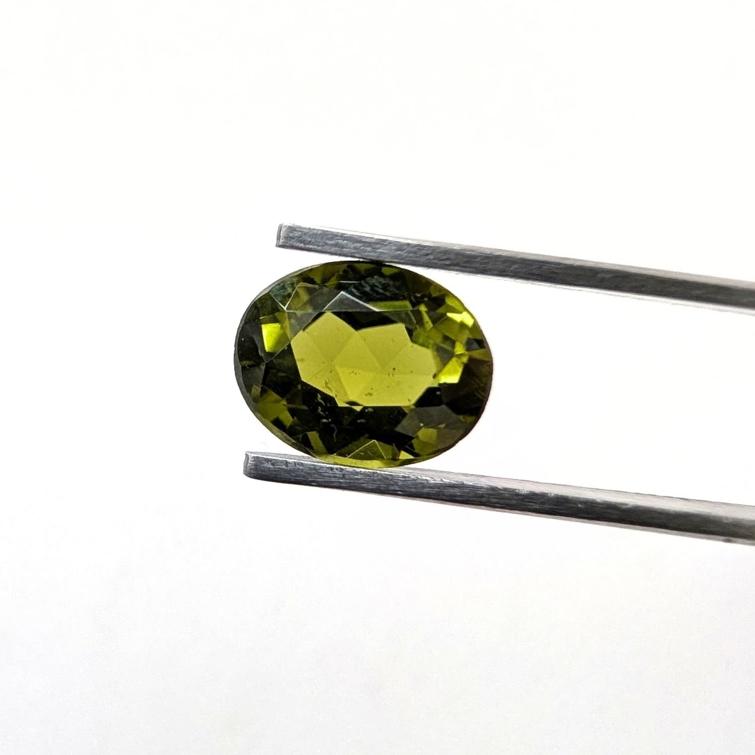 Peridot Oval - 10.1mm by 8mm